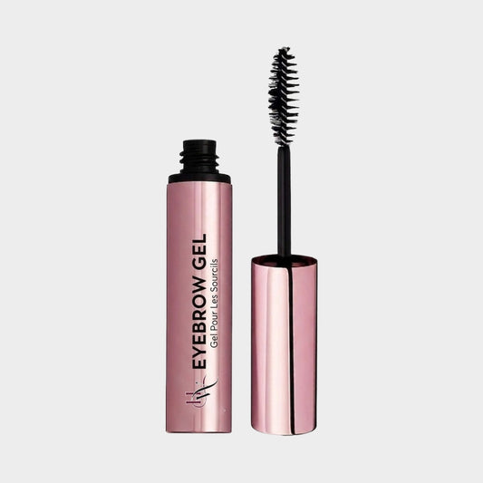 Eyebrow gel and brush on a light gray background